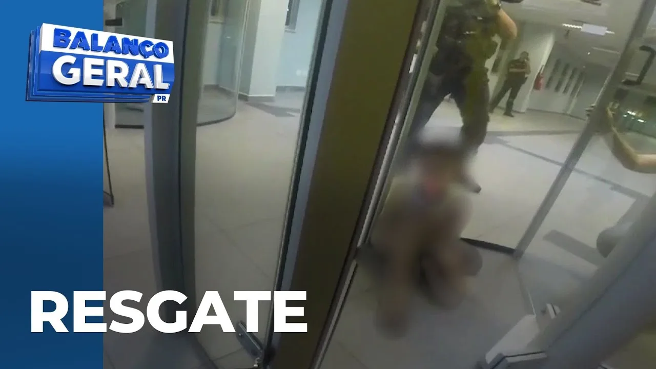 Criança fica presa em porta giratória de agência bancária; Guarda Municipal faz o resgate