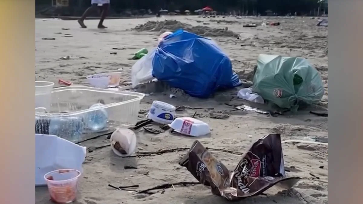 Fotógrafo grava praia de Guaratuba cheia de lixo após festas