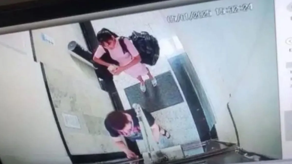 Câmeras de segurança do prédio da amiga de Vanessa registraram o momento em que ela deixa o local com duas malas (Foto: reprodução / câmera de segurança)