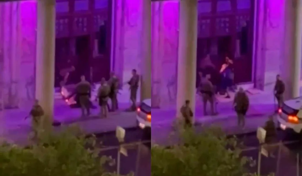 Policiais militares agredindo moradores de rua com fogo e chutes