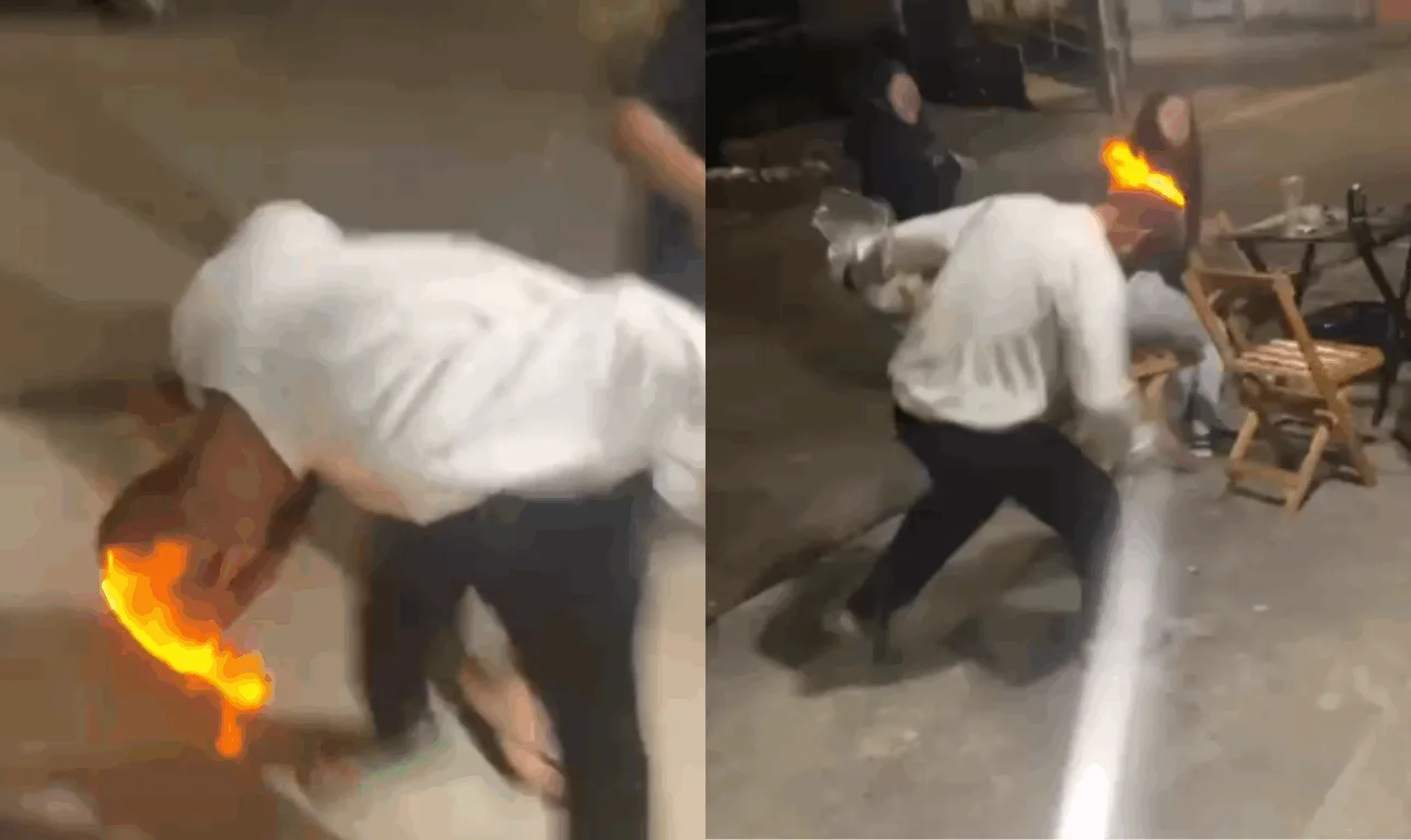 Homem bêbado tentando tirar o fogo da cabeça