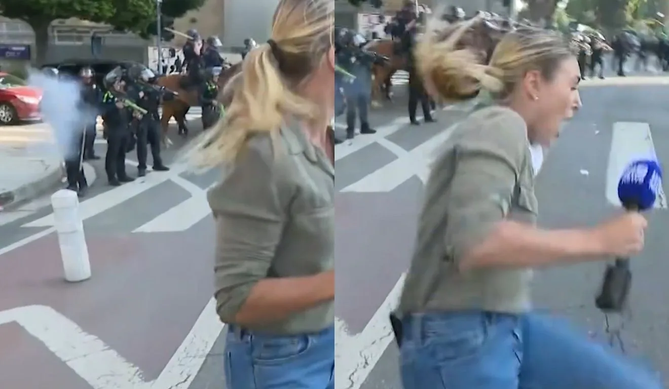 repórter levando tiro de policial