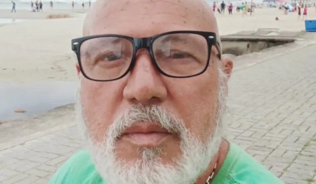 Advogado encontrado morto com óculos e sério em foto