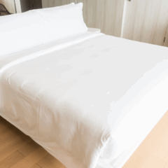 Imagem ilustrativa de uma cama.