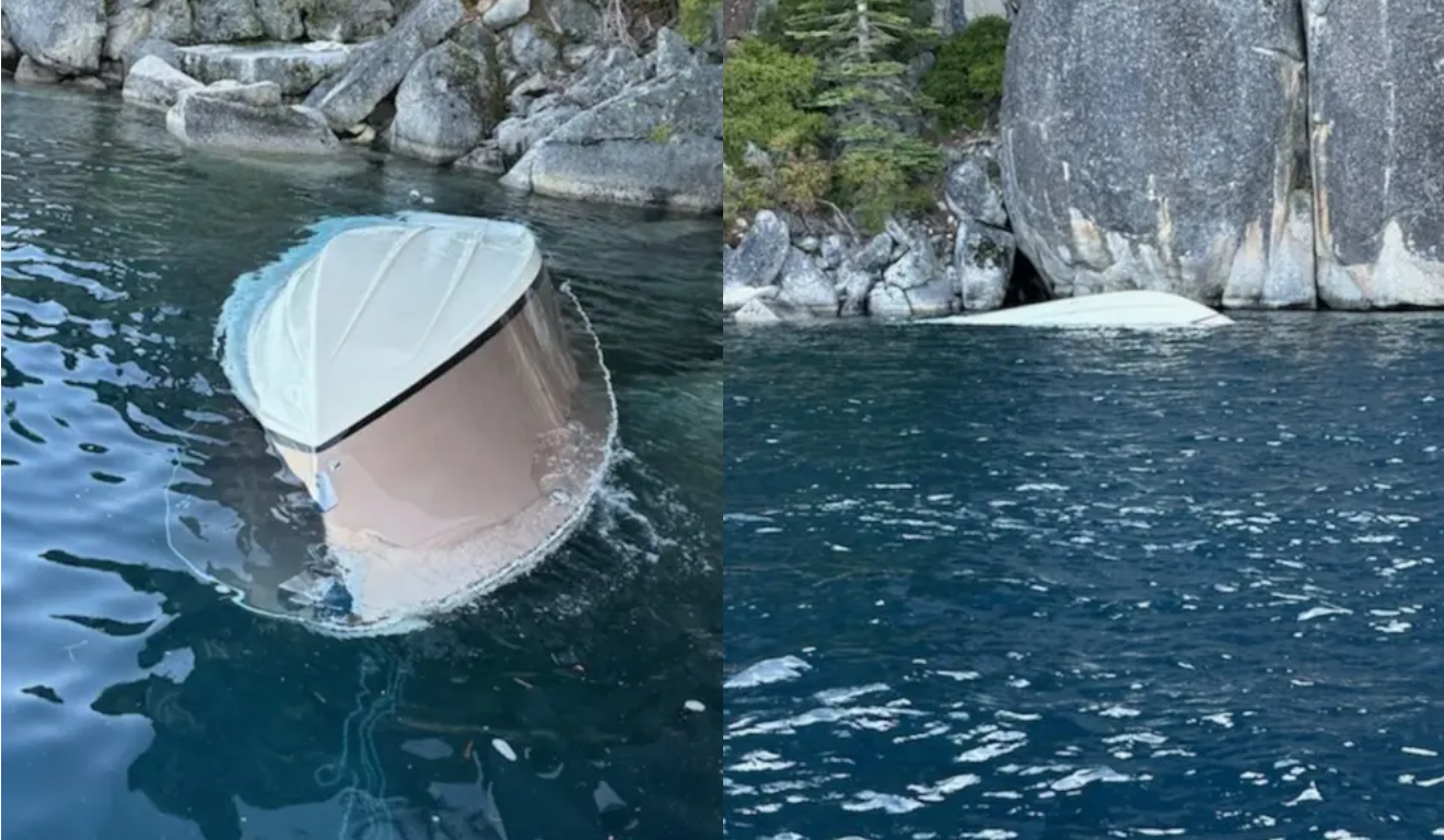 Imagem do barco virado no lago.