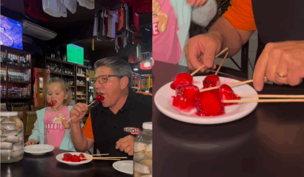 Imagem de Sizeus e a filha provando o rollmops do amor.