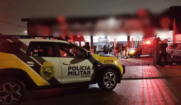 Polícia Militar em ocorrência de suspeito que invadiu centro automotivo e matou dois