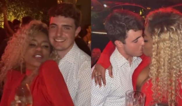 Cariúcha e filho de Gugu se beijando.