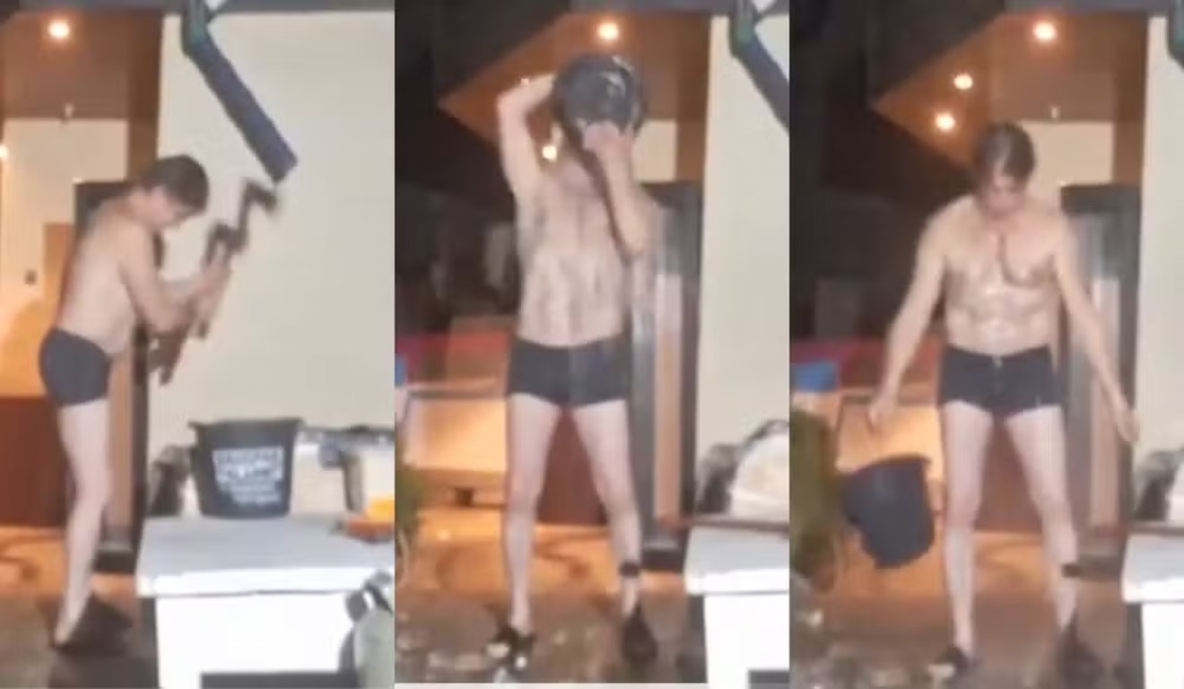 Homem jogando água em cabeça.