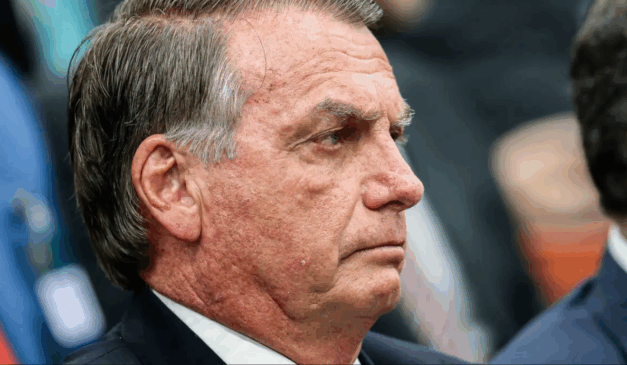 Presidente Jair Bolsonaro sério, durante audiência no STF, que apura tentativa de golpe de estado