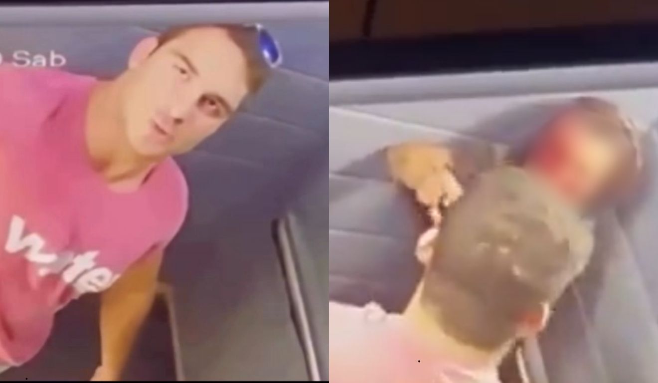 homem que espancou namorada olhando para câmera do elevador