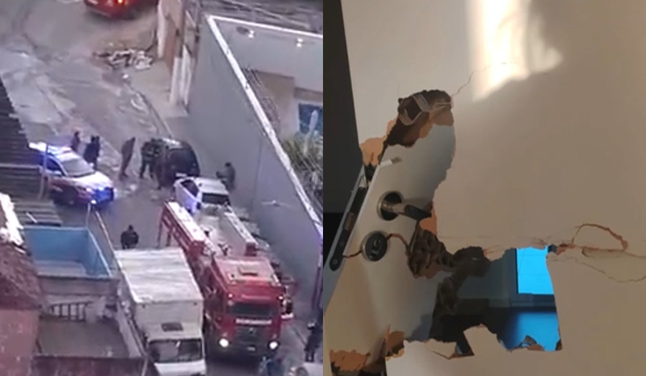 Corpo de bombeiros e porta quebrada.