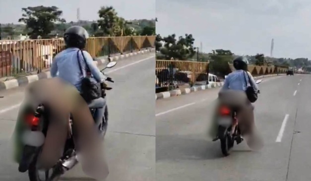 Homem carregando esposa morta na garupa de moto