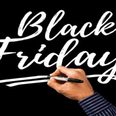 imagem com uma mão escrevendo black friday escrita em uma parede preta