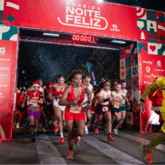 pessoas correndo durante a prova da corrida noite feliz