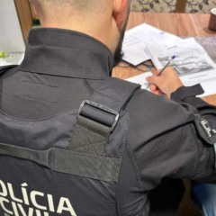 Policial civil do Paraná durante operação contra o Golpe do Presente