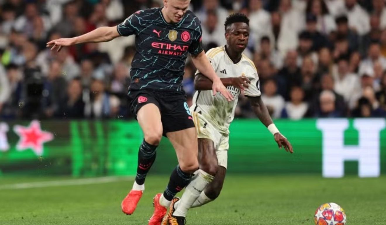 Haaland e Vini Júnior são duas das estrelas de Real Madrid x Manchester City. (Foto: Violeta Santos Moura/Reuters)