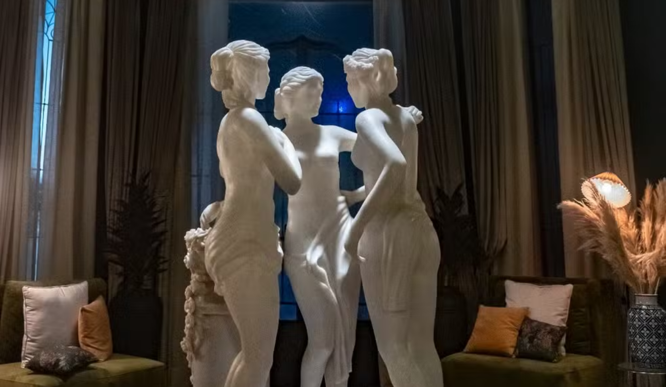 Imagem da estátua das Três Graças.