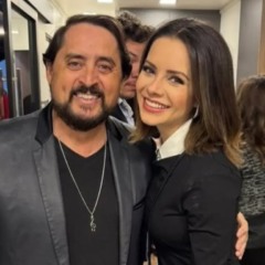 Sandy ao lado do tio, que faleceu