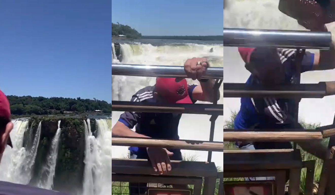 Turista pula grade de proteção e entra em área proibida para visitantes nas Cataratas do Iguaçu na Argentina.