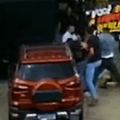 pai e filho agredidos loja de ve&iacute;culos Curitiba